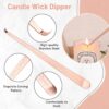 Using rose gold wick trimmer to trim candle wick for clean burn